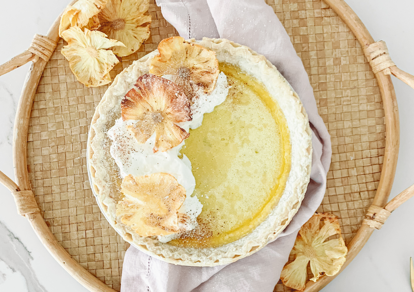 A Marigold Pineapple Coconut Pie With Pineapple Blossoms