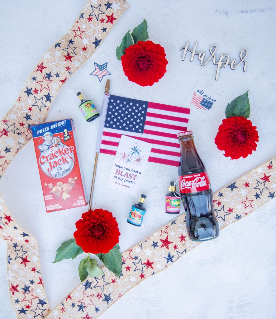 A red, white, and blue firework cake smash for a 4th of July baby